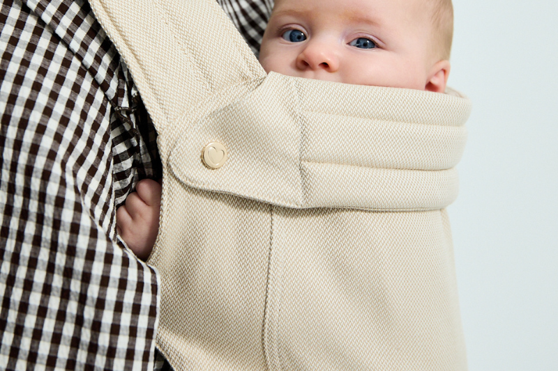 Mesh oder Bio-Baumwolle bei Babytragen: Warum „luftig“ nicht automatisch angenehmer bedeutet